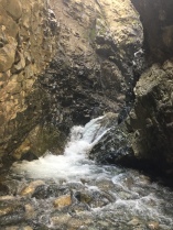 A unique waterfall within a cave.